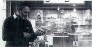  Des surrounded by his 'Bottled Fleet' in the Maritime Museum 